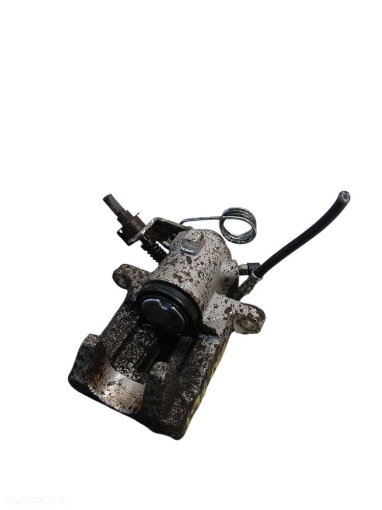 ZACISK HAMULCOWY LEWY TYŁ VW GOLF IV ZACISK HAMULCOWY LEWY TYŁ GOLF IV - 4