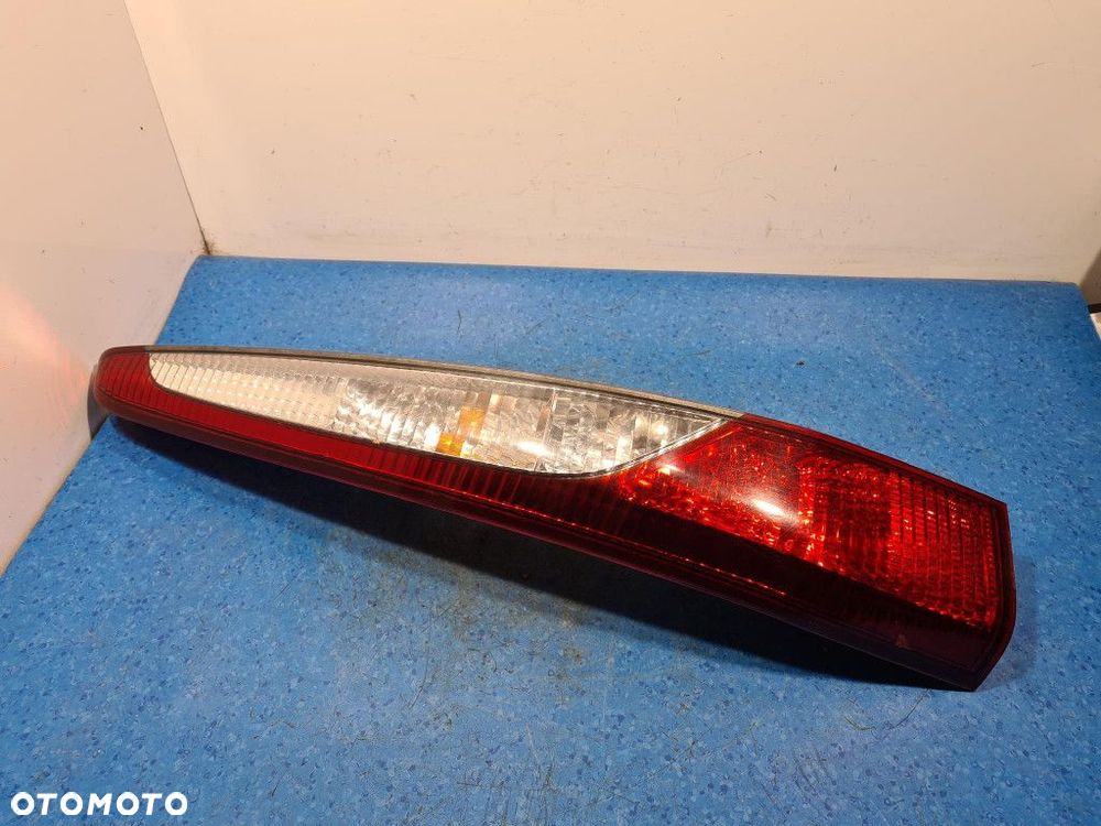 MITSUBISHI LANCER VII KOMBI LAMPA TYŁ LEWA ZEWNĘTRZNA - 1