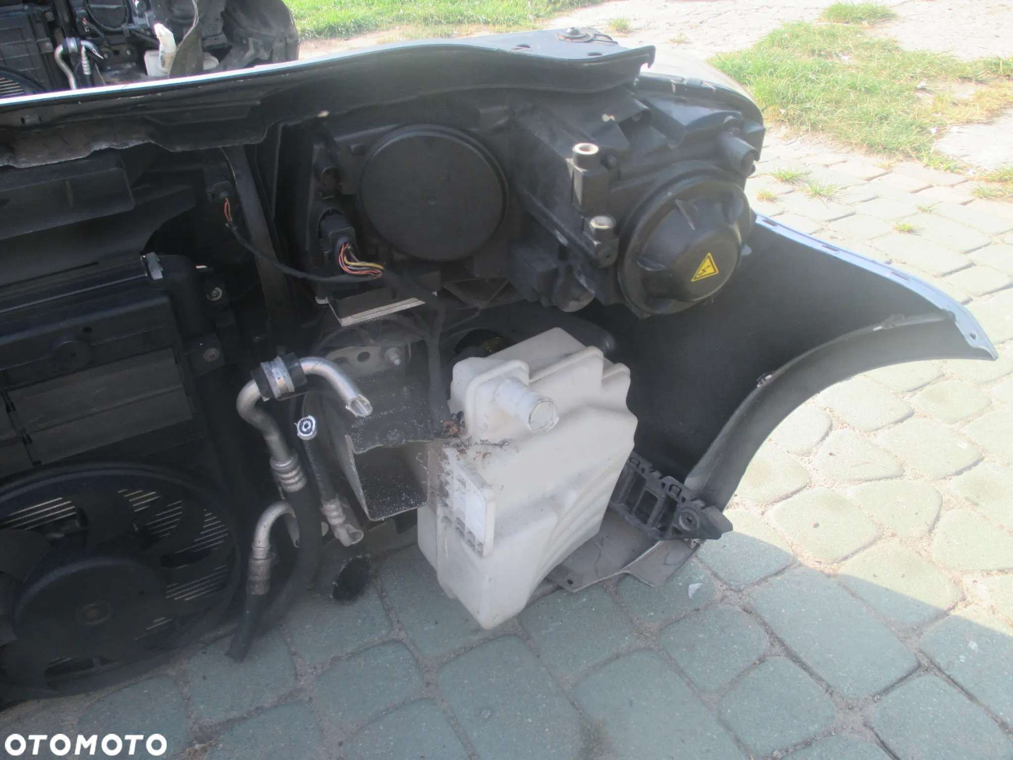 pas chłodnice zderzak lampa Xenon VW Touran I lift - 6