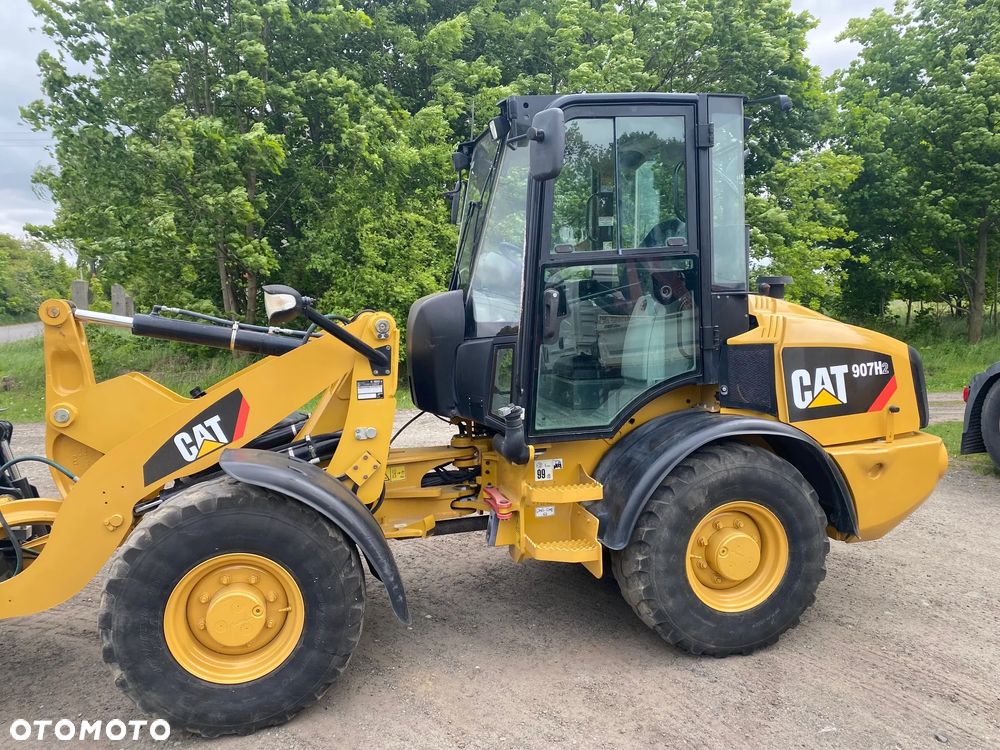 Caterpillar CAT 907H2, 2014 ROK, 4900 MTH, ŁYŻKA OTWIERANA + WIDŁY, z NIEMIEC, - 14