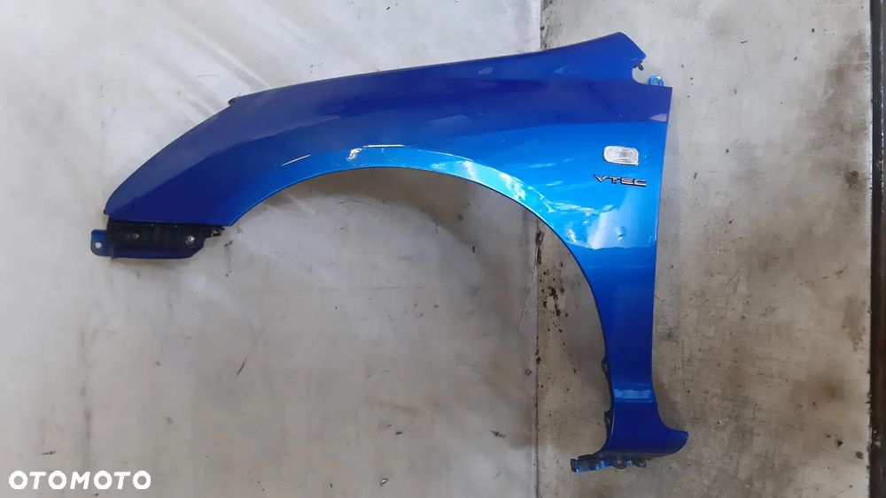 * HONDA CIVIC VII 7 BŁOTNIK PRZEDNI LEWY B520P NIEBIESKI