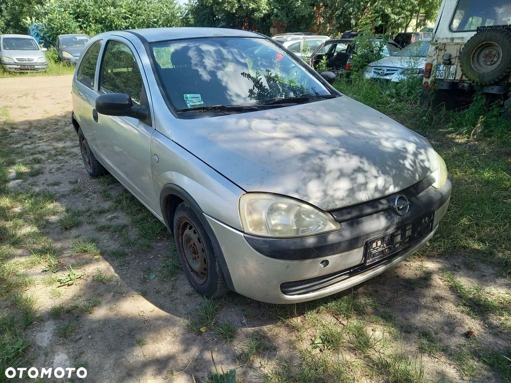 części OPEL CORSA C hatchback 3drzwi 1.0 benzyna 2002r. Srebrny maska drzwi zderzak klapa fotele - 2