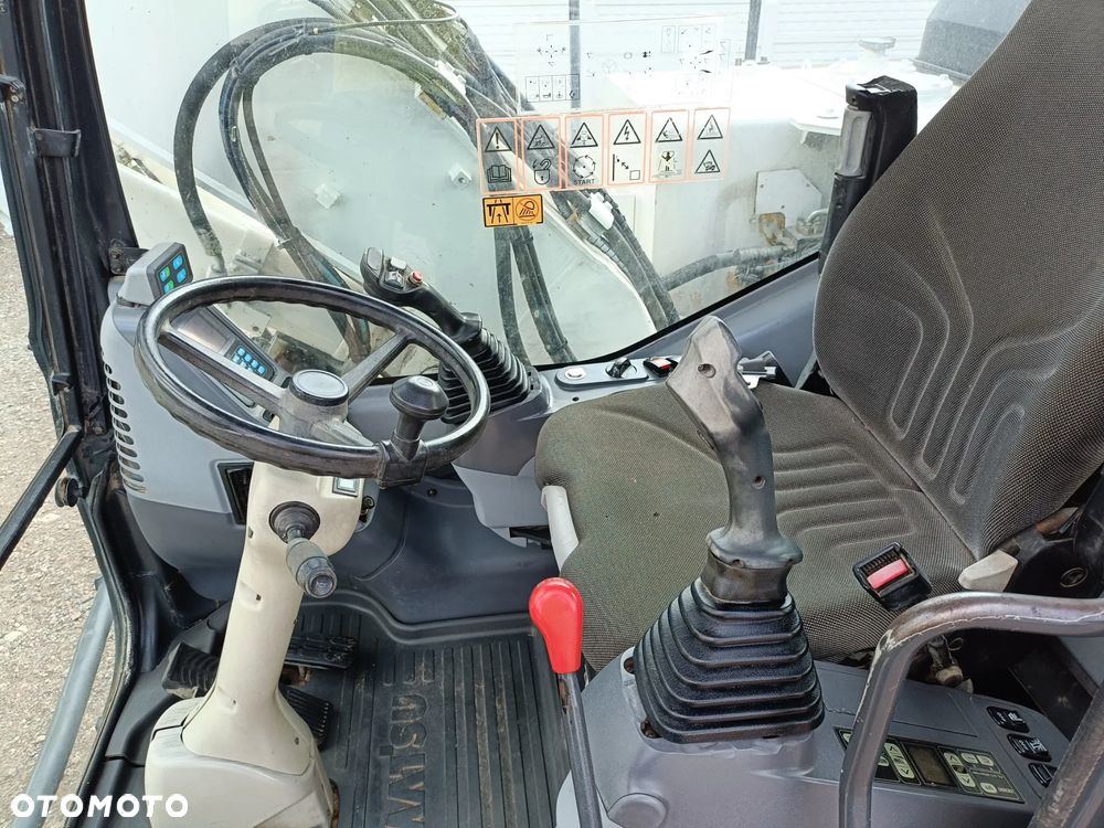 Komatsu PW 140 - 9