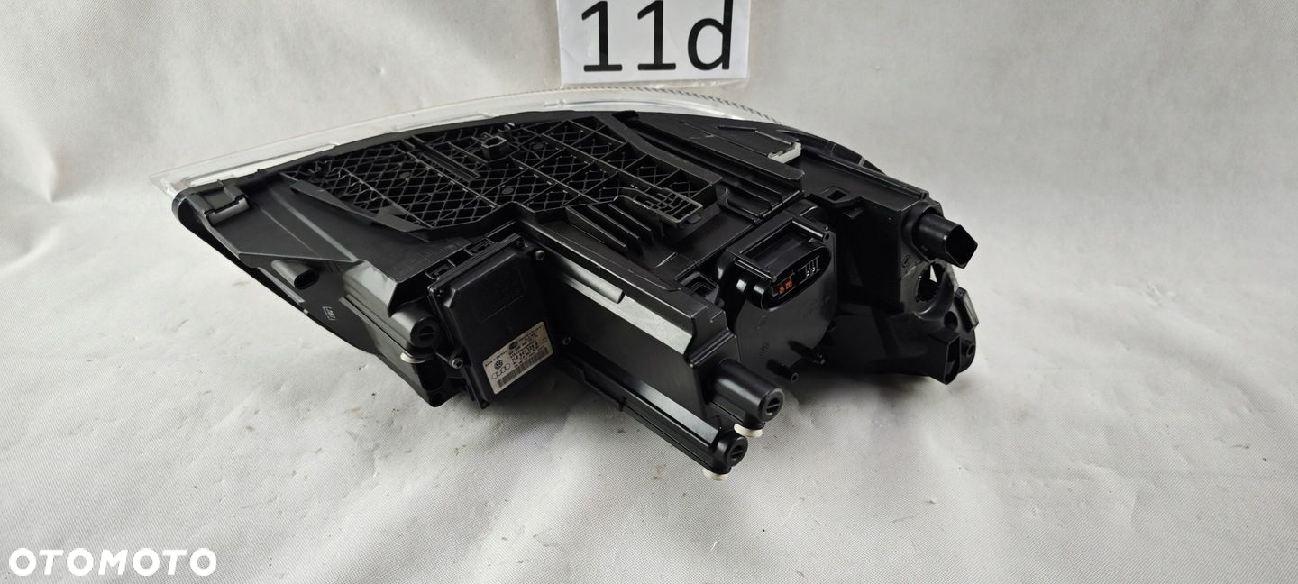 SKODA OCTAVIA II LIFT XENON SKRĘTNY LEWY REFLEKTOR LAMPA LEWA 1Z1941015G - 9