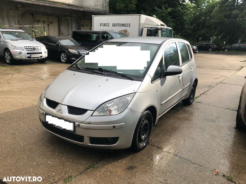 Dezmembrez Mitsubishi Colt 4 usi gri argintiu benzina cutie automata 2006 - 2