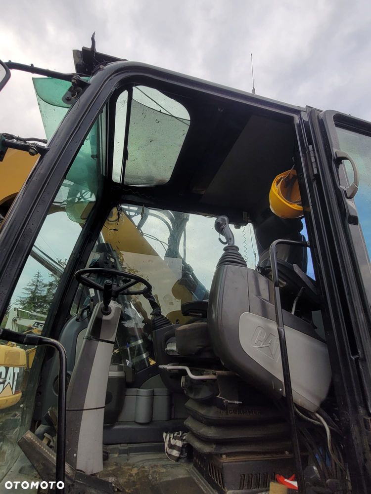 Caterpillar M318D - 8