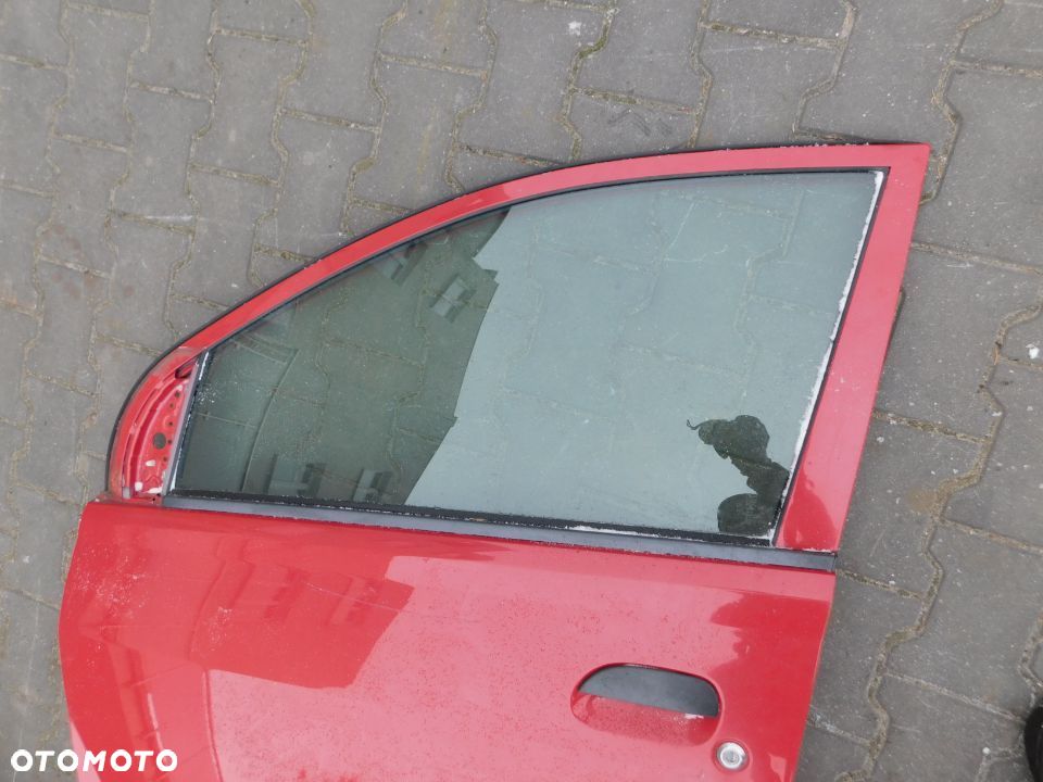 drzwi lewe przód DAIHATSU CUORE VI 03-07 L251  5d - 7
