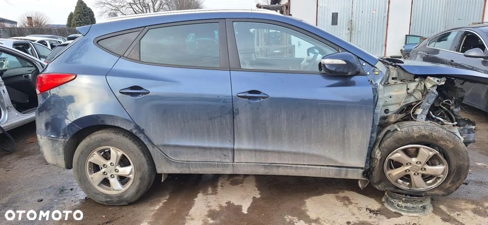Hyundai IX35 B6 błotnik lewy przód - 7
