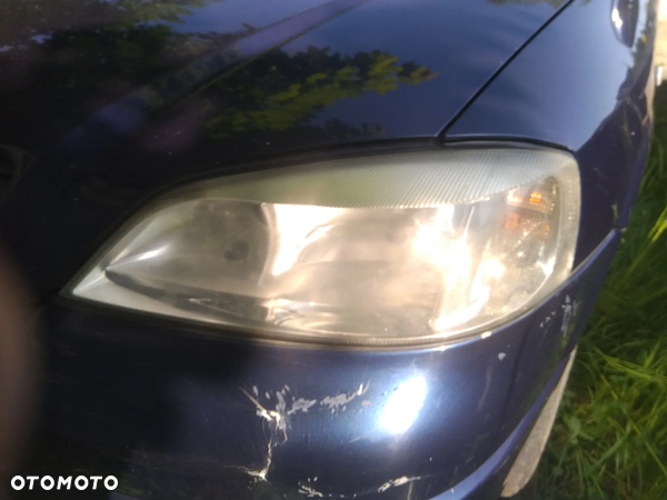 Opel Astra 1.6 lampa przednia lewa