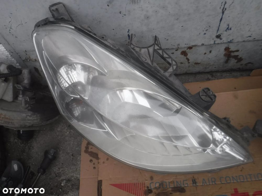Peugeot Partner II  lampa przod lewa prawa EUROPA - 8