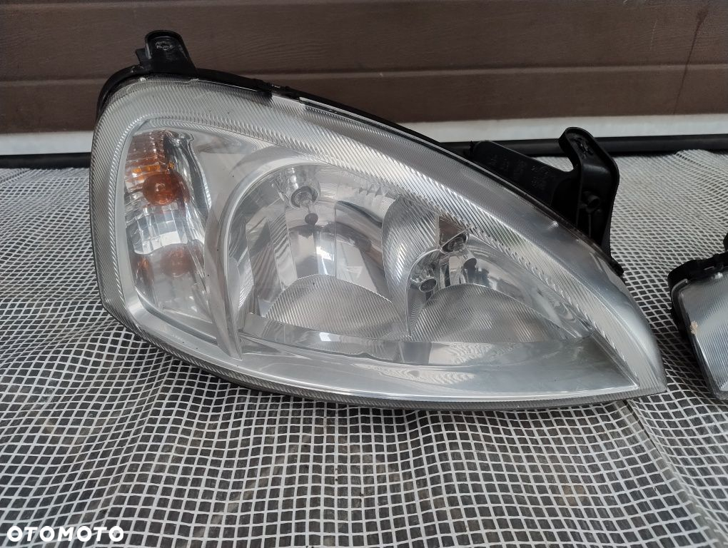 Opel Corsa c lift Europa lampa reflektor prawy lewy komplet DJ auto - 2