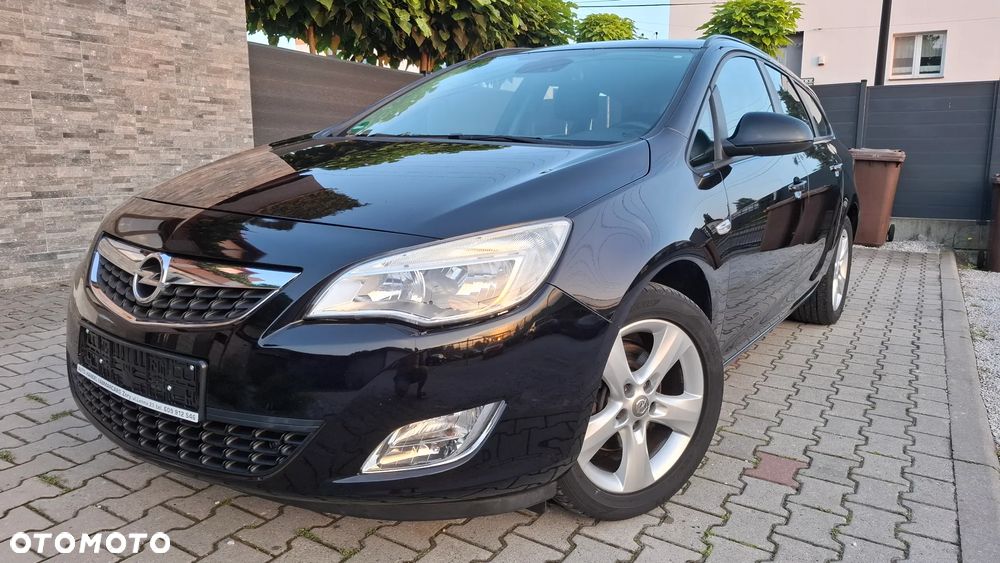 Opel Astra 1.6 Turbo Edition Sport - 1