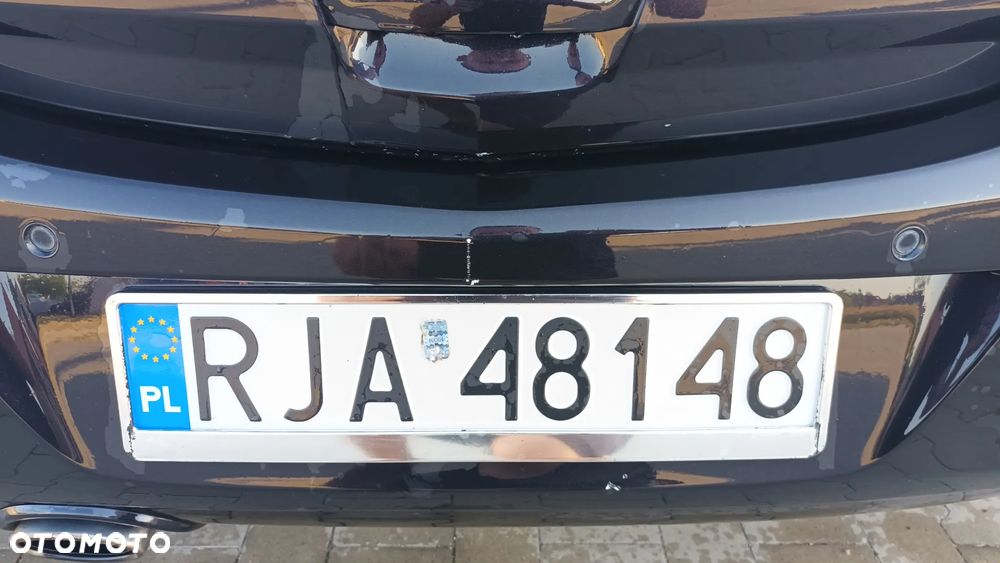 Opel Corsa 1.4 16V Enjoy - 11