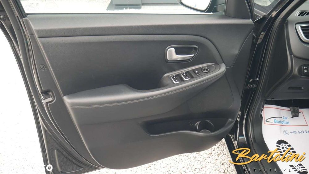 Kia Carens - 11