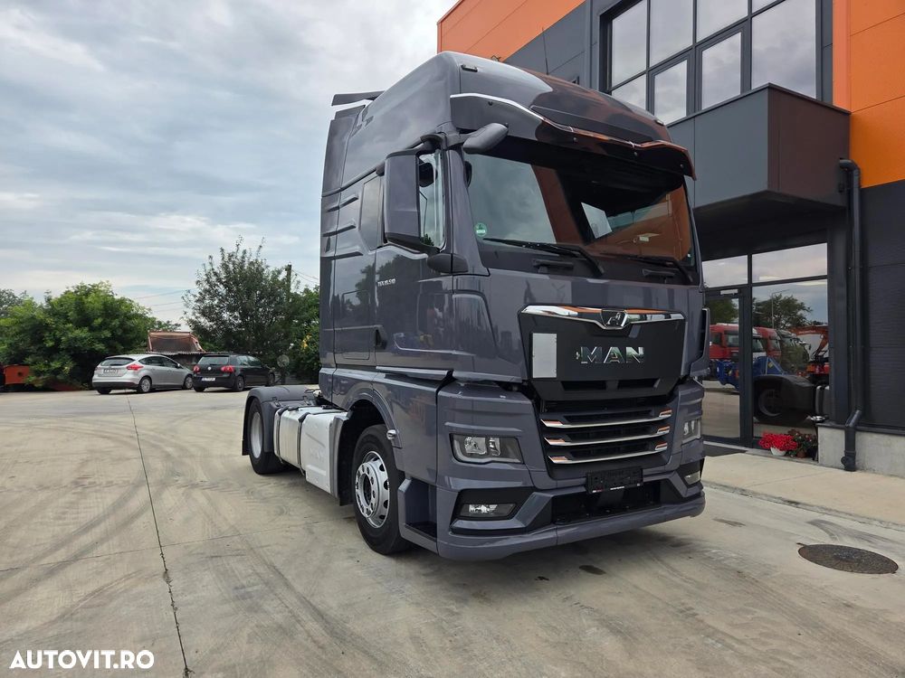 MAN TGX 18.510, 2023,126.353, AUTOMATA+RETARDER, 2 paturi, Cab inalta si lata cu SPOILERE, KIT BASCULARE, FRIGIDER, rulata in GERMANIA, Carte Identitate RAR, rezervor 600l aluminiu, volan piele, CA NOU, posibilitate leasing 4 ani-PROMOTIE 66.900 EUR+Tva - 34