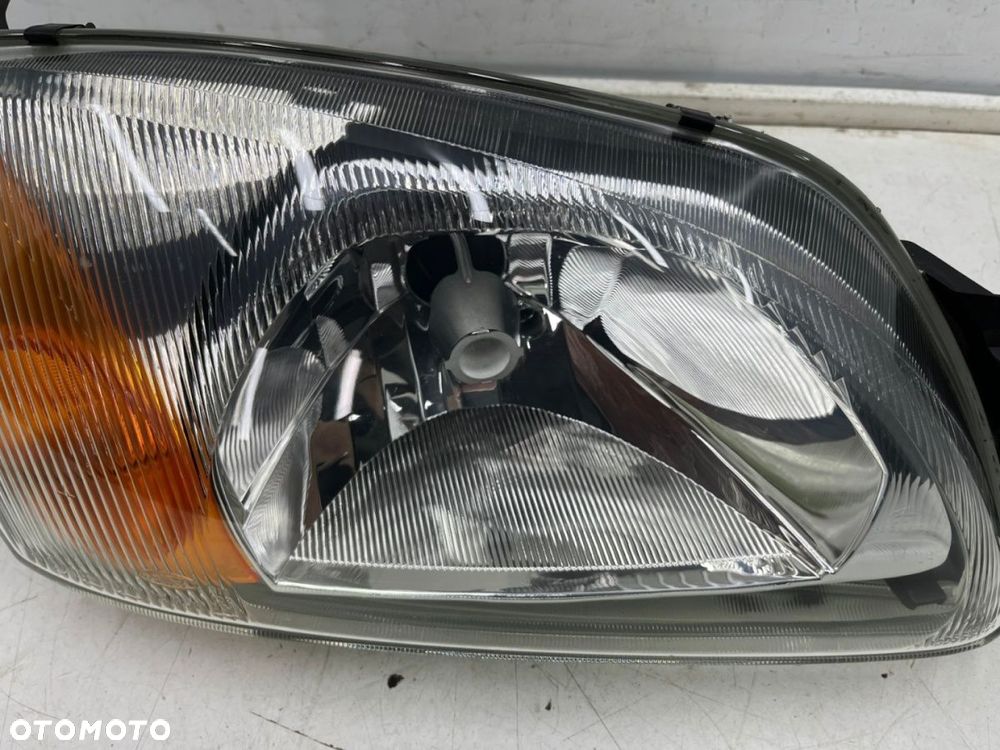 Lampa reflektor Ford Fiesta IV MK4 LIFT 99-02r. prawa przednia Europa oryginal Bosch - 5