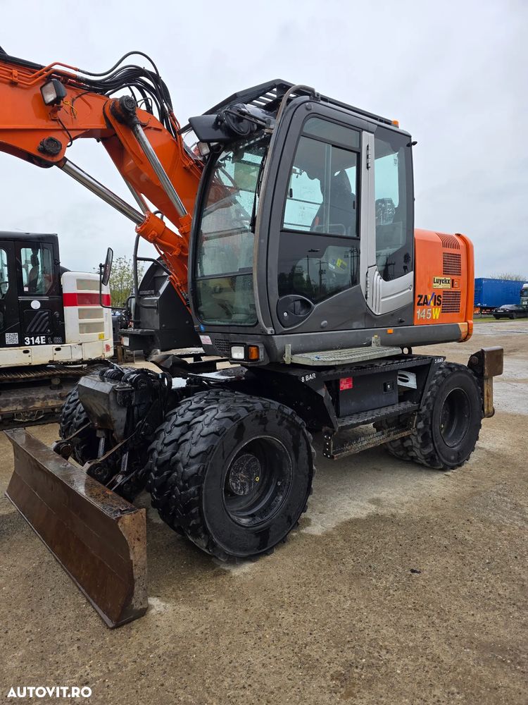 Hitachi ZX145 - W excavator pe roti pe pneuri compact - 2