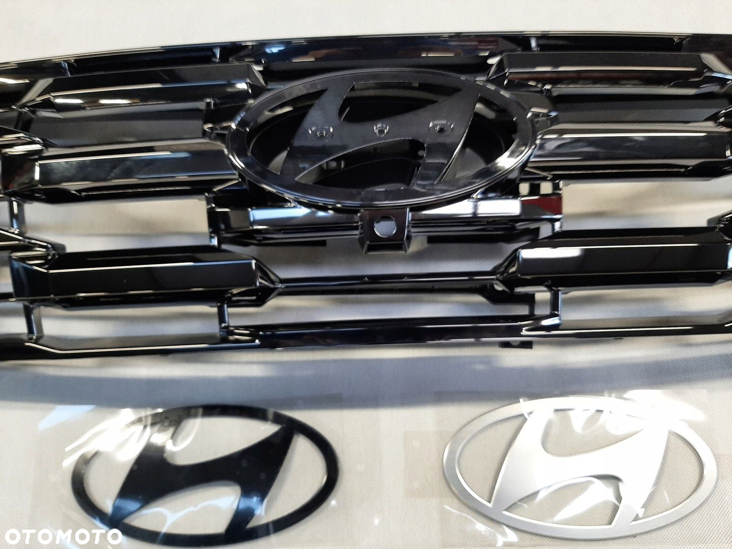HYUNDAI TUCSON IV LIFT 2024- ATRAPA CHŁODNICY GRILL EMBLEMAT 86351-N7HB0 - 2