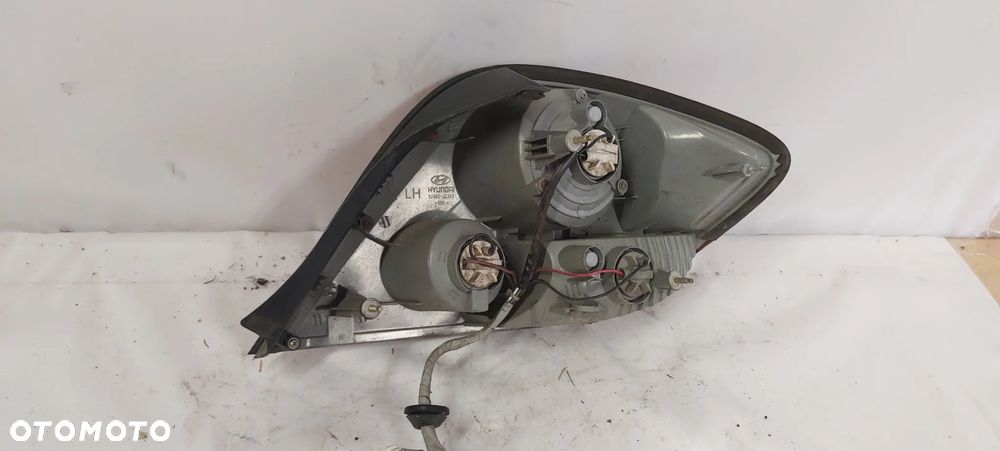 .  TYL TYLNA LAMPA LEWA HYUNDAI COUPE 2 - 4
