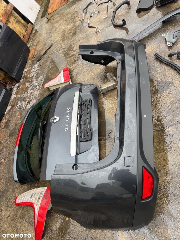 Renault grand scenic 3  grandscenic TEB66  / EA3 / Jz1V / TLALLE / SZHR / SAN513 // D22240 drzwi prawe lewe przednie tylne tył przód kompletny przód grand Scenic 3 szary ciemny drzwi prawe lewe lusterko składane zderzak tył tylni klapa bagażnika klapa tył lampy tył tylnie prawa lewa belka tylnia Podszybie kompletne osłoną słupka prawa lewa zawiasy maski prawy lewy wąż węże klimy podstawa akumulatora zbiorniczek spryskiwaczy filtr powietrza belka dolna przednia na dole zbiorniczek płynu chłodzącego  Lampa prawa lewa bixenon xenon 08120 /260100027r / 89902929  błotnik przód przedni prawy lewy maska pas przedni benzyna tce 130 benzyna zderzak przód przedni pdc 4 czujniki spryski Zenona komplet - 20