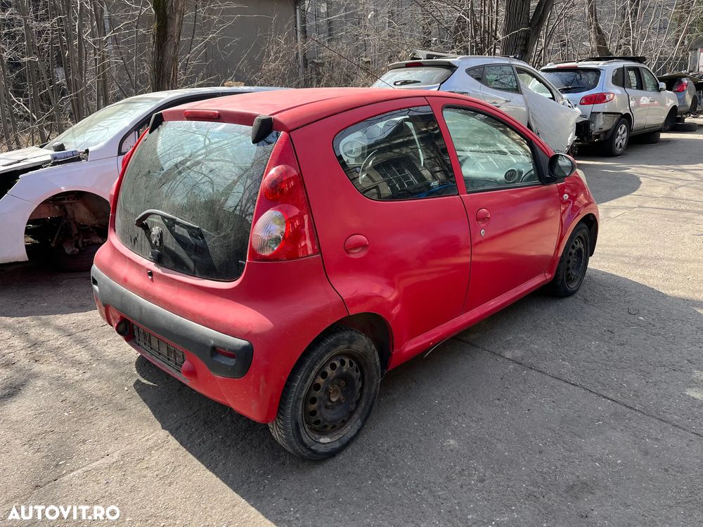 Dezmembrez Peugeot 107 rosu 2007 1.0 benzina 4usi - 15