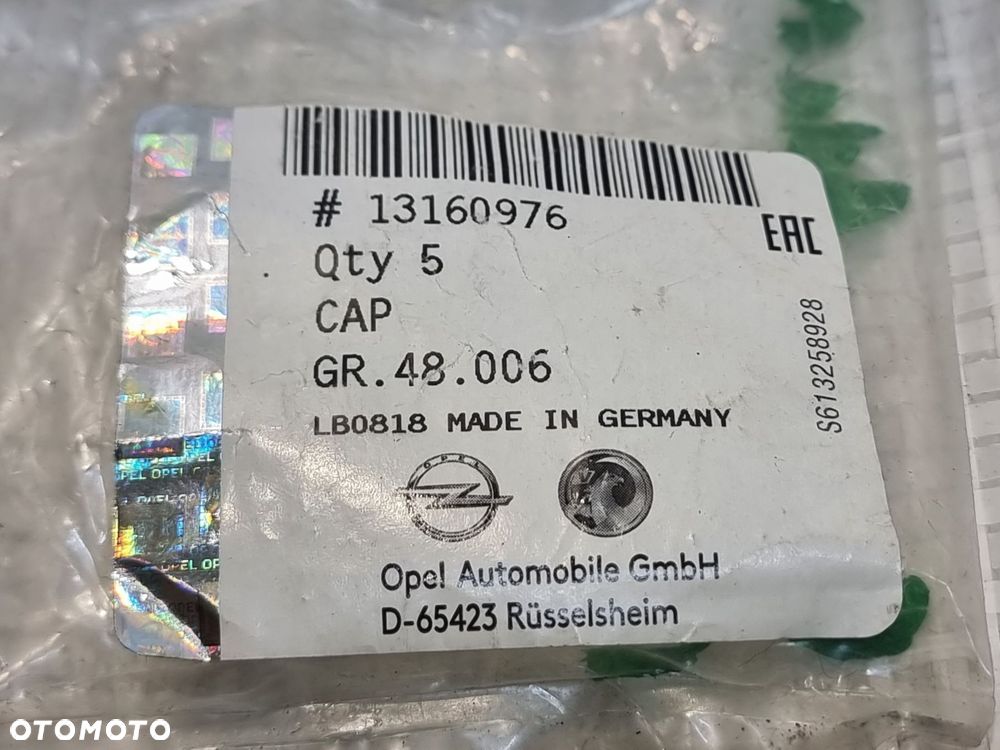 NAKŁADKA ŚRUBY KOŁA OPEL CORSA C D MERIVA A B ADAM ASTRA H 13160976 NOWE - 2