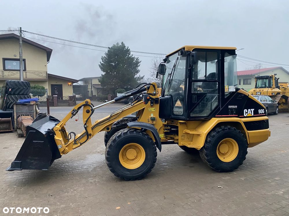 Caterpillar CAT 906, ŁYŻKA + WIDŁY, SUPER STAN, z NIEMIEC, SERWISOWANA W CAT - 1