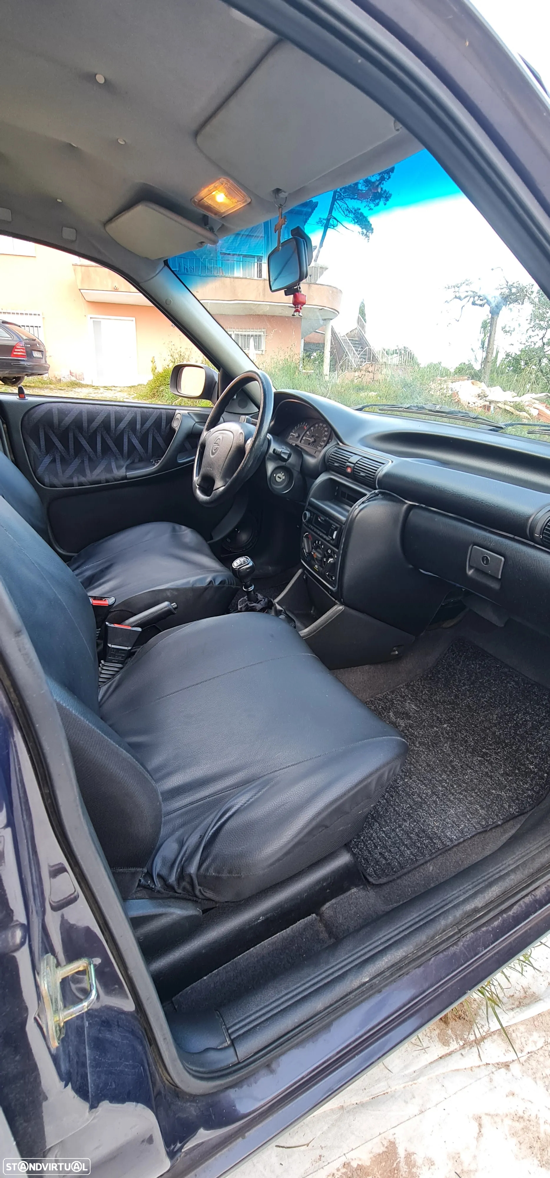 Opel Astra 1.4i GLS - 9