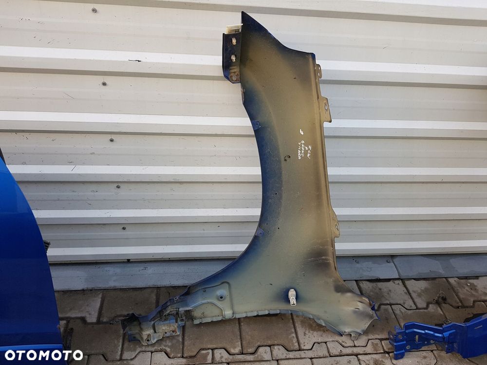 GRAND VITARA II 05r- BŁOTNIK PRAWY PRZÓD ZCW - 4