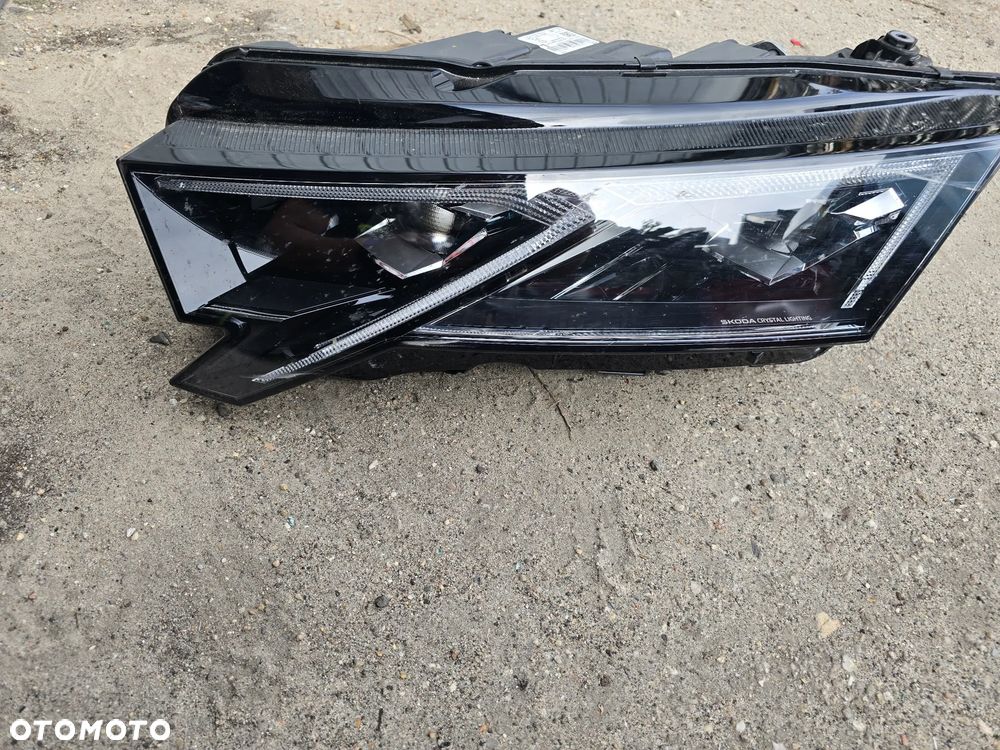 Reflektor  lewy przód  skoda  octavia  IV  lift  5E4 941 035 - 1
