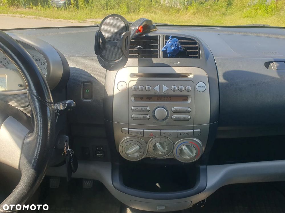 Daihatsu Sirion 1.3 CooLine - 9