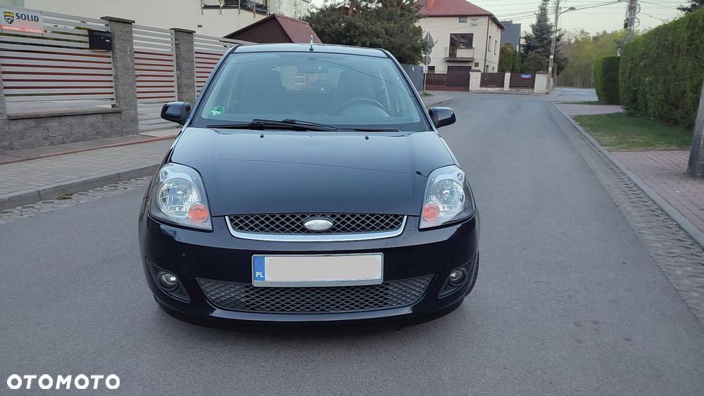 Ford Fiesta 1.4 Ghia - 13