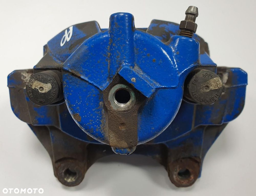 ZACISK HAMULCOWY PRAWY PRZÓD OPEL CORSA D 1.6 T 16V - 2