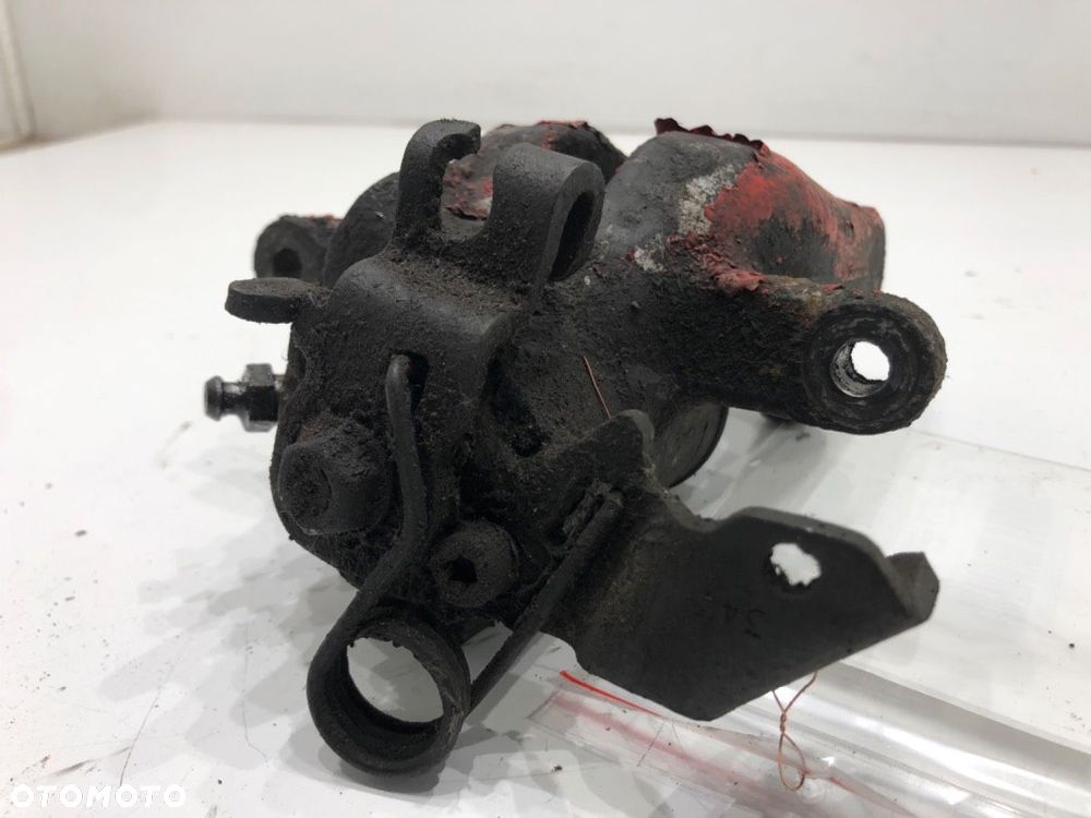 ZACISK PRAWY TYŁ  OPEL ZAFIRA B Nadwozie pełne/minivan (A05) 2005 - 2015 1.9 CDTI VAN (M75) 88 kW - 3