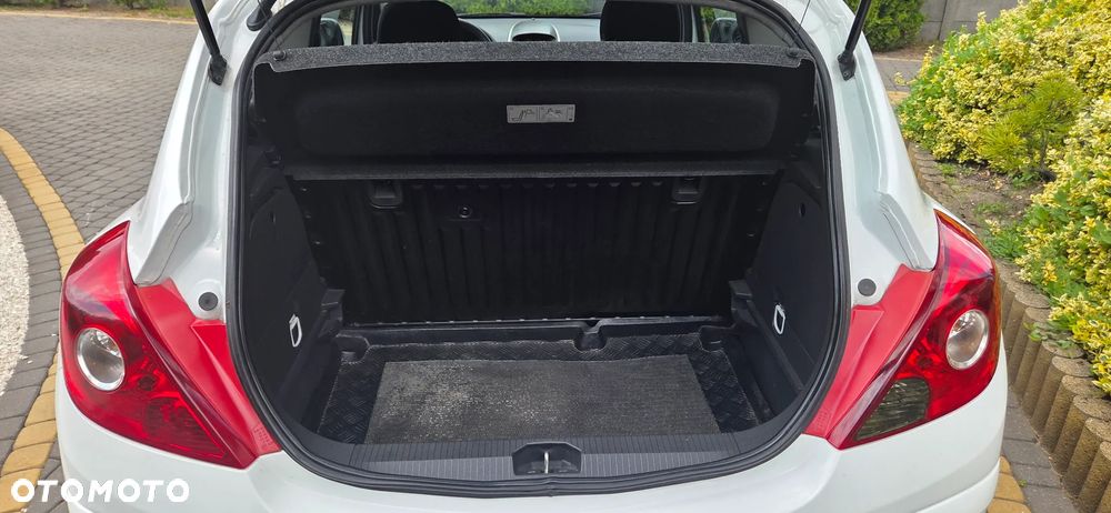 Opel Corsa 1.2 16V Enjoy - 11
