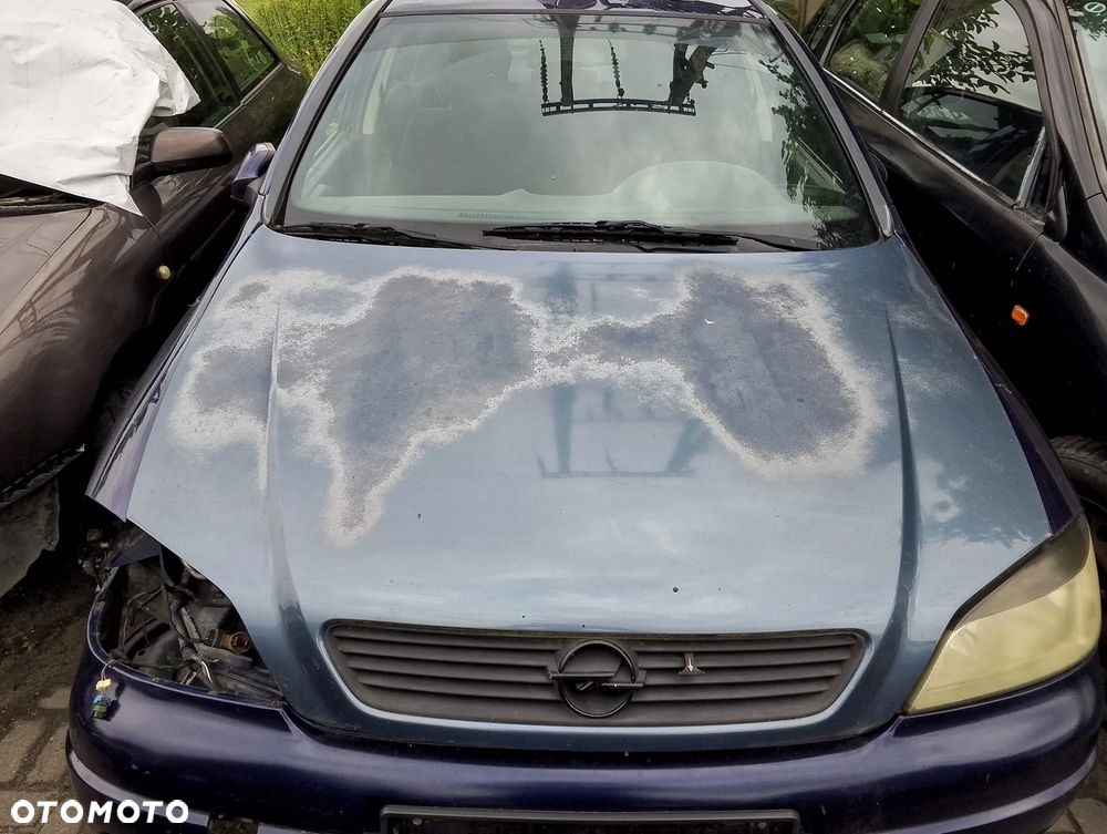 Opel Astra G (98-09r.) 1.4B 89KM. Silnik X14XE Skrzynia MG4 lakier Z282 / 13L / 13U. Cały na części. GWARANCJA !!! Przód Tył Zestaw Komplet Drzwi Klapa Zderzak Błotnik Maska Grill Atrapa Szyba Pas Lampa Lusterko Boczki Fotel Kanapa Kokpit Deska Rozdzielcza Przełącznik Włącznik Sterownik Przewody Wiązka Instalacja Moduł Komputer Czujnik Listwa Pompa Alternator Wtryski Głowica Rozrusznik Kompresor Sprzęgło Dwumas Silnik Skrzynia ABS Klimatyzacji Paliwa Wspomagania Kolektor Turbina Przepustnica Zawór Chłodnica Koło Hak Belka Sanki Zawieszenie Mcpherson Półoś Amortyzator Wydech Tłumik Zacisk Most - 2