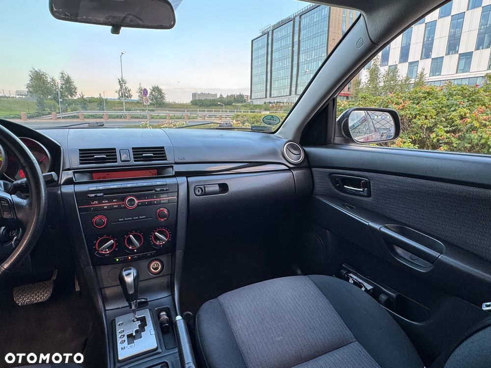 Mazda 3 2.0 Exclusive + - 9