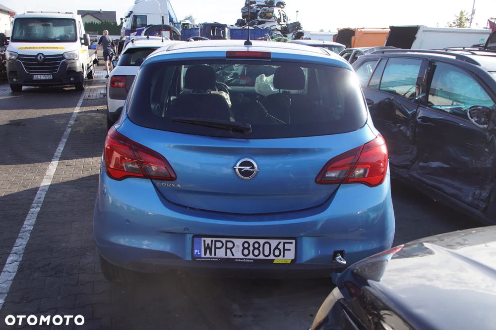 Auto na części - Opel Corsa E 1.4 Twinport 90 KM B14XEL F17 Z22V 2018R Silnik Skrzynia Drzwi Błotnik Zderzak Klapa Lampa Lusterko Klamka Szyba Deska Kokpit Sterownik Moduł Czujnik Licznik Panel Kierownica - 7