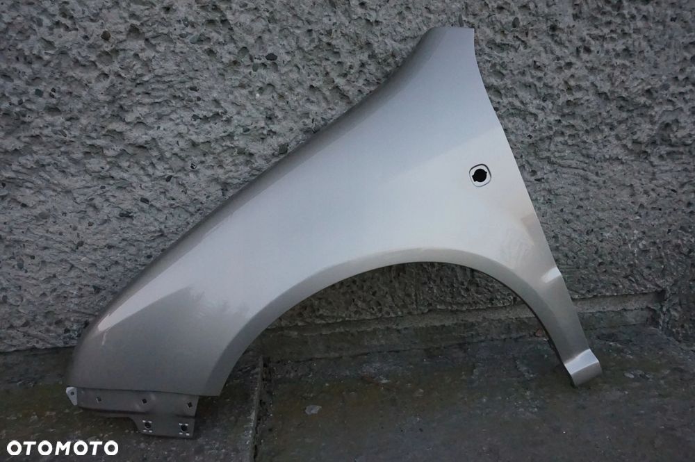 BŁOTNIK PRZEDNI LEWY SKODA FABIA I 1 9201 - 1