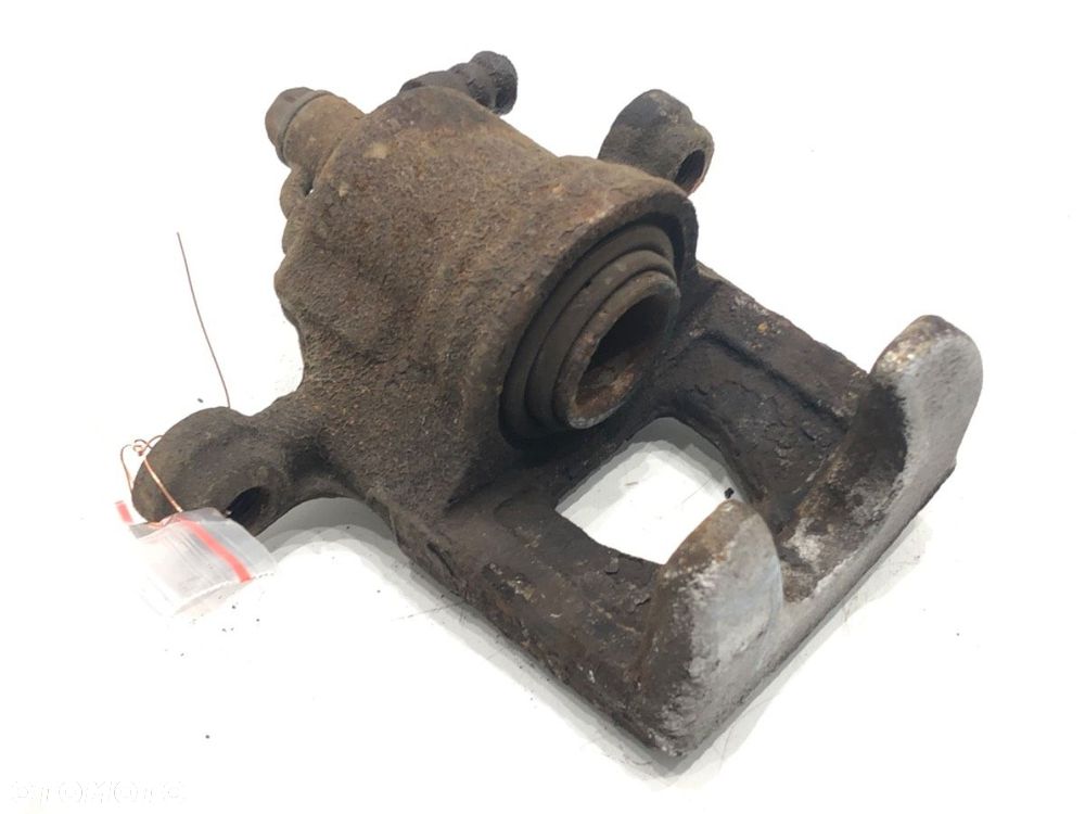 ZACISK LEWY TYŁ  NISSAN QASHQAI / QASHQAI +2 I (J10, NJ10, JJ10E) 2006 - 2014 2.0 104 kW [141 KM] - 3