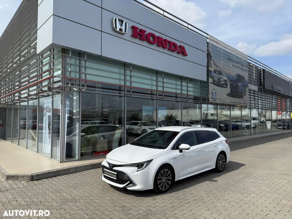 Toyota Corolla 1.8 HSD Exclusive - 1