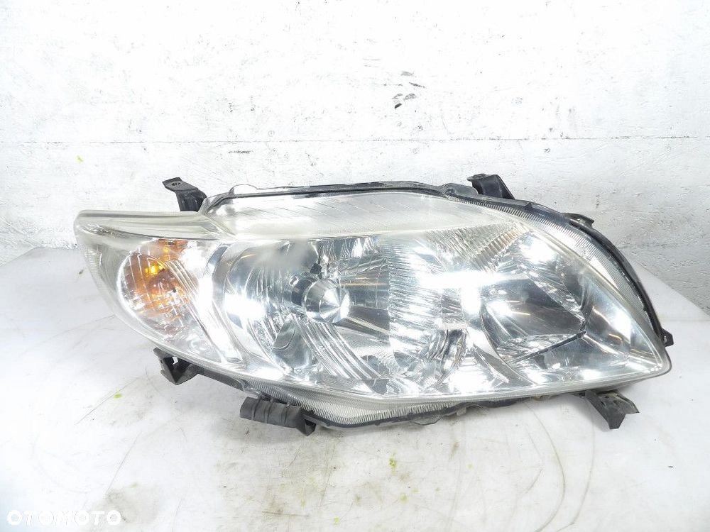 TOYOTA COROLLA E14 E15 LIFT REFLEKTOR PRAWY XENON KOITO 12-520 - 1