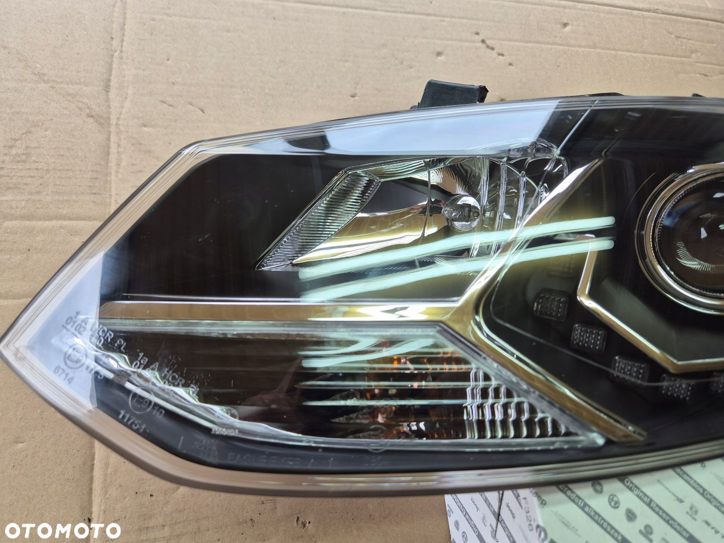 Volkswagen Golf VII reflektor lewy.Eagle Eyes.100 - 2