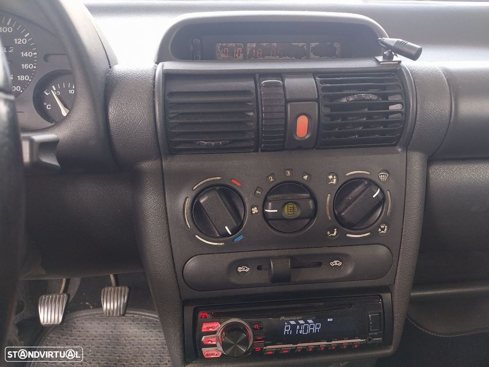 Opel Corsa 1.2 CDX - 7