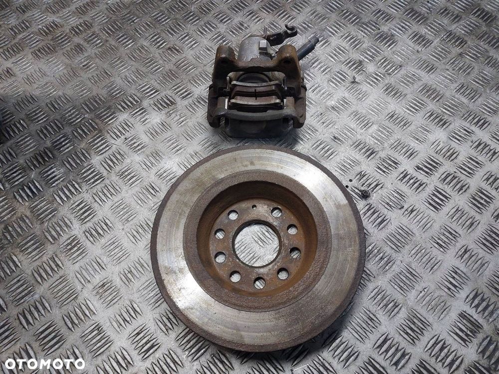 ZACISK HAMULCOWY PRAWY TYŁ + TARCZA SKODA SUPERB II - 2