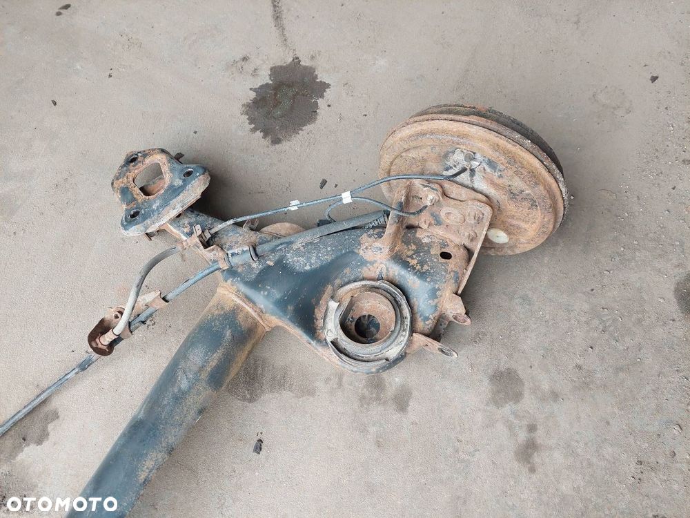 BELKA OŚ ZAWIESZENIA TYŁ BĘBNY Z ABS OPEL CORSA D HB 3D - 5