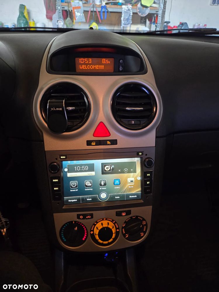 Opel Corsa 1.2 16V Enjoy - 6