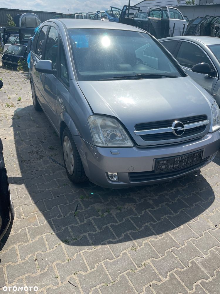 OPEL MERIVA A LAMPA XENON PRAWA LEWA 93321055 93321054