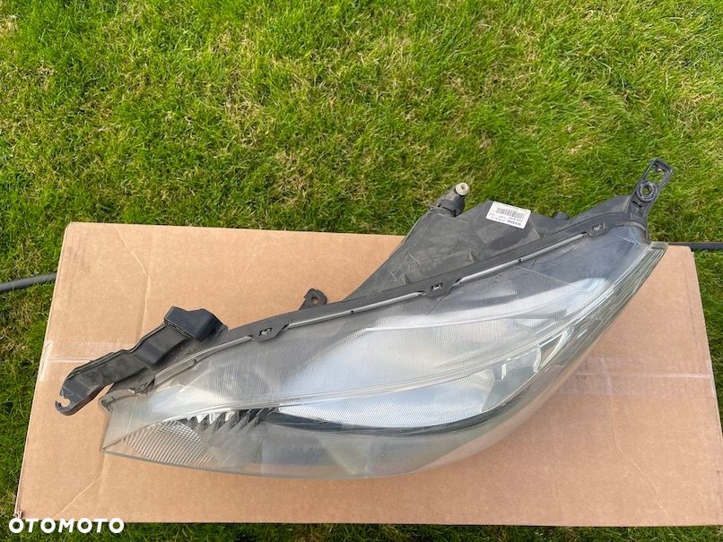 lampa lewa przód nissan nv200 oe 26060bj10a - 9