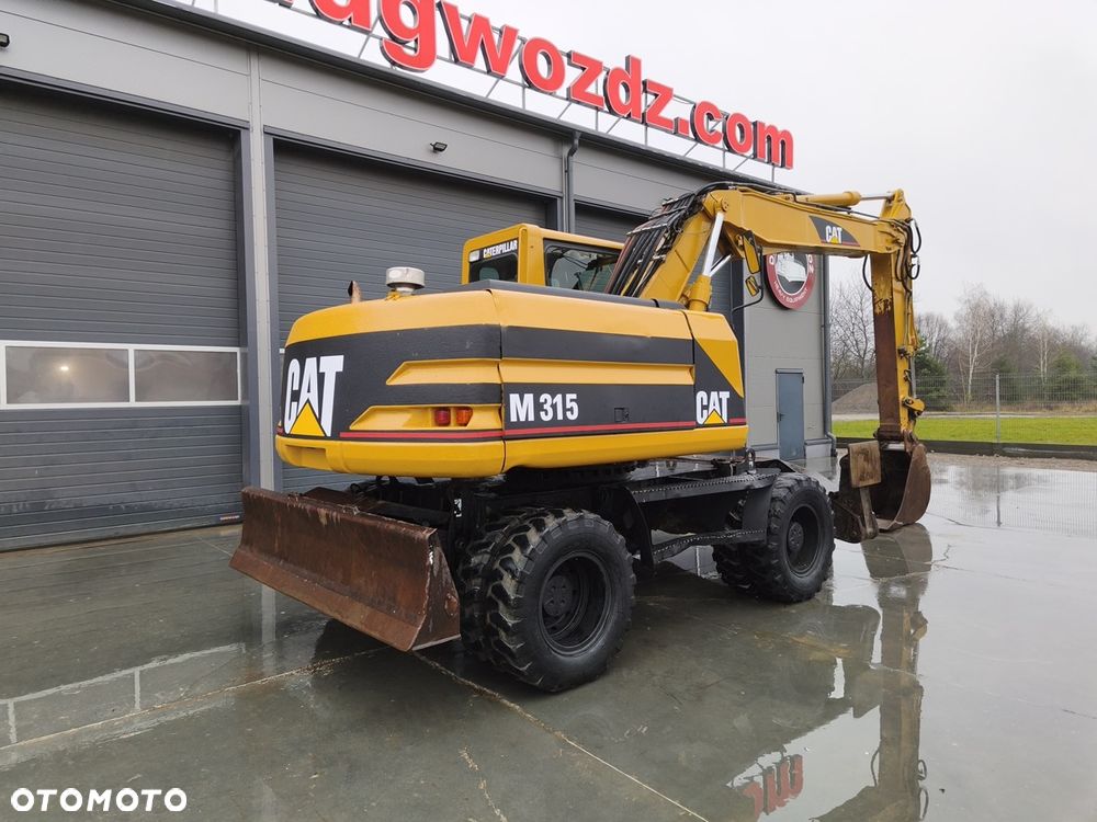 Caterpillar M315 - 4